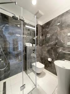 Phòng tắm tại Spa Residence Carbona Royal Suites 1.11