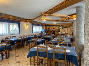 Restoranas ar kita vieta pavalgyti apgyvendinimo įstaigoje Hotel Santoni