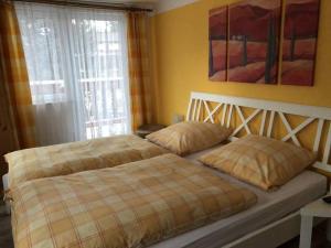 Кровать или кровати в номере Haus Stadtflucht