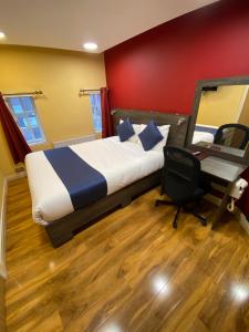 Postel nebo postele na pokoji v ubytování Ville Hotel