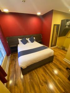 Postel nebo postele na pokoji v ubytování Ville Hotel