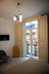 A bed or beds in a room at U'Panare