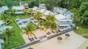an aerial view of a house with a swimming pool at White Oaks Villas in Trou aux Biches