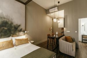 Uma cama ou camas num quarto em Royal Collection Covilh