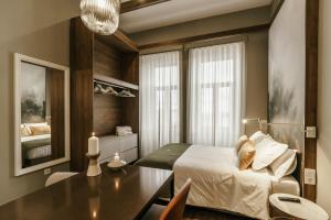 Uma cama ou camas num quarto em Royal Collection Covilh