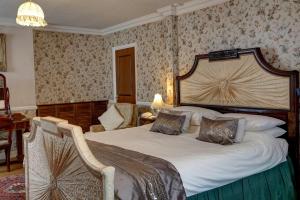 En eller flere senge i et værelse på Best Western Bell in Driffield