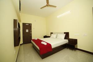 Voodi või voodid majutusasutuse Akash Residency toas