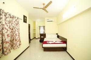 Voodi või voodid majutusasutuse Akash Residency toas