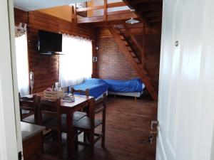 Postel nebo postele na pokoji v ubytování Cabañas Los Teros