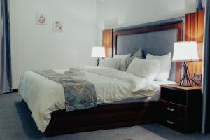 A bed or beds in a room at Sinclair Lake Chad