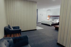 A bed or beds in a room at Sinclair Lake Chad