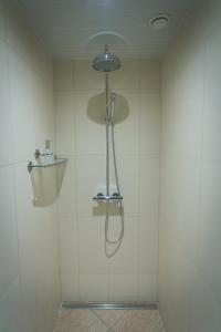 Vonios kambarys apgyvendinimo įstaigoje Arina Guest Apartment