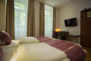 Postel nebo postele na pokoji v ubytování Best Western Plus Hotel Arcadia + 37 fotografií