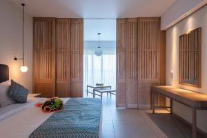 Posteľ alebo postele v izbe v ubytovaní Silver Beach Hotel & Apartments