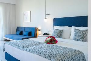 Posteľ alebo postele v izbe v ubytovaní Silver Beach Hotel & Apartments