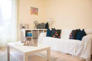 Posteľ alebo postele v izbe v ubytovaní Azúr Apartman Keszthely