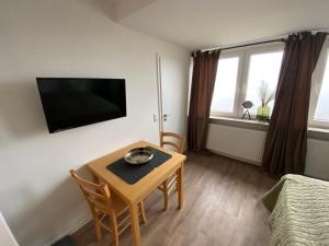 TV a/nebo společenská místnost v ubytování Pension Haus Talblick