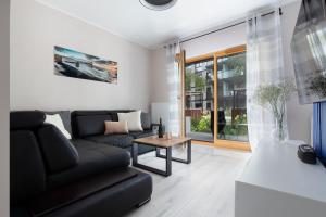 Posedenie v ubytovaní Elite Apartments Nadmotławie Prestige