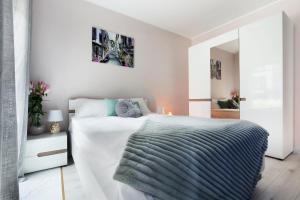 Posteľ alebo postele v izbe v ubytovaní Elite Apartments Nadmotławie Prestige + 26 fotografií