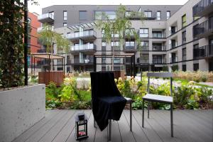 Vonkajšia záhrada v ubytovaní Elite Apartments Nadmotławie Prestige