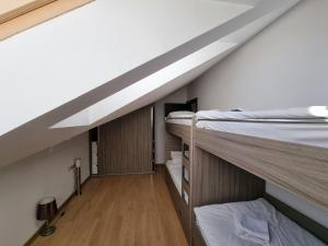 Postel nebo postele na pokoji v ubytování Apartment for 8 in New Gudauri