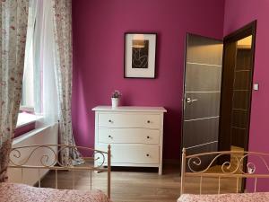 Posteľ alebo postele v izbe v ubytovaní Apartament Janek