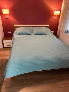 Posteľ alebo postele v izbe v ubytovaní Apartament Janek