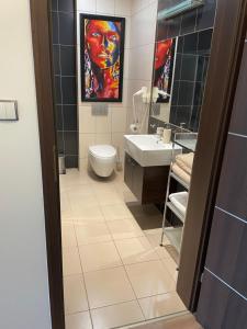 Kúpeľňa v ubytovaní Apartament Janek