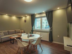 Posezení v ubytování APARTMANI INFINITY