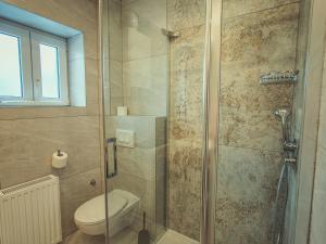 Koupelna v ubytování APARTMANI INFINITY