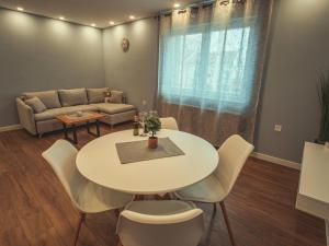 Posezení v ubytování APARTMANI INFINITY