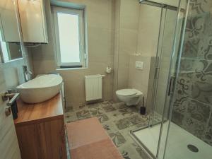 Koupelna v ubytování APARTMANI INFINITY