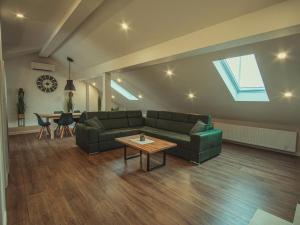 Posezení v ubytování APARTMANI INFINITY