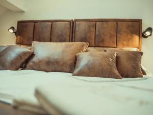 Postel nebo postele na pokoji v ubytování APARTMANI INFINITY