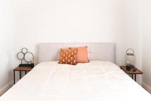 Postel nebo postele na pokoji v ubytování B&B landhuis Hauwaart 80