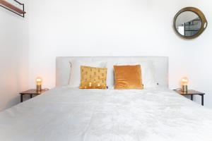 Postel nebo postele na pokoji v ubytování B&B landhuis Hauwaart 80