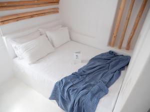 Ένα ή περισσότερα κρεβάτια σε δωμάτιο στο 8 Keys Residence