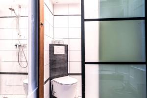 Et badeværelse på Montmartre Apartments - Androuet