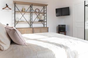 Postel nebo postele na pokoji v ubytování B&B landhuis Hauwaart 80