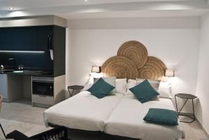 Posteľ alebo postele v izbe v ubytovaní Aparthotel El Cargol