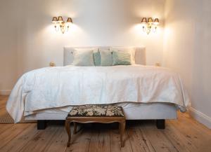 Postel nebo postele na pokoji v ubytování B&B landhuis Hauwaart 80