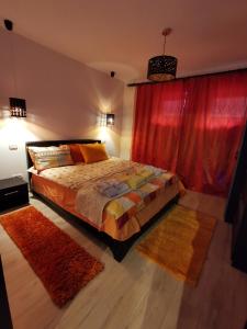 Ένα ή περισσότερα κρεβάτια σε δωμάτιο στο Apartament Kalinderu K3 Busteni