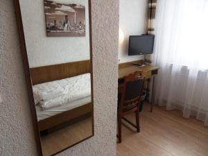 TV a/nebo společenská místnost v ubytování Hotel Linnert
