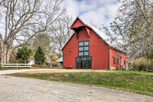 a red barn with a white roof at Bloomington Cabin 4 Mi to Indiana University in Bloomington