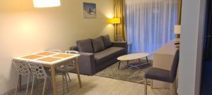 Posedenie v ubytovaní Apartament Czarna Góra S6