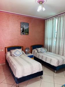 A bed or beds in a room at cozy apartment city center near the sea playa wifi!!