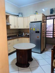 A kitchen or kitchenette at cozy apartment city center near the sea playa wifi!!