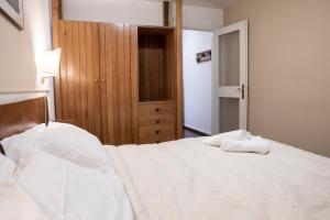 Letto o letti in una camera di Hotel Hermitage