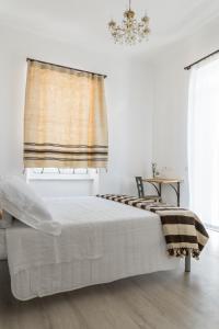 Posteľ alebo postele v izbe v ubytovaní Agriturismo Belvedere 9
