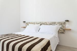 Posteľ alebo postele v izbe v ubytovaní Agriturismo Belvedere 9
